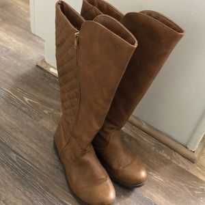 Tall brown zip up boots